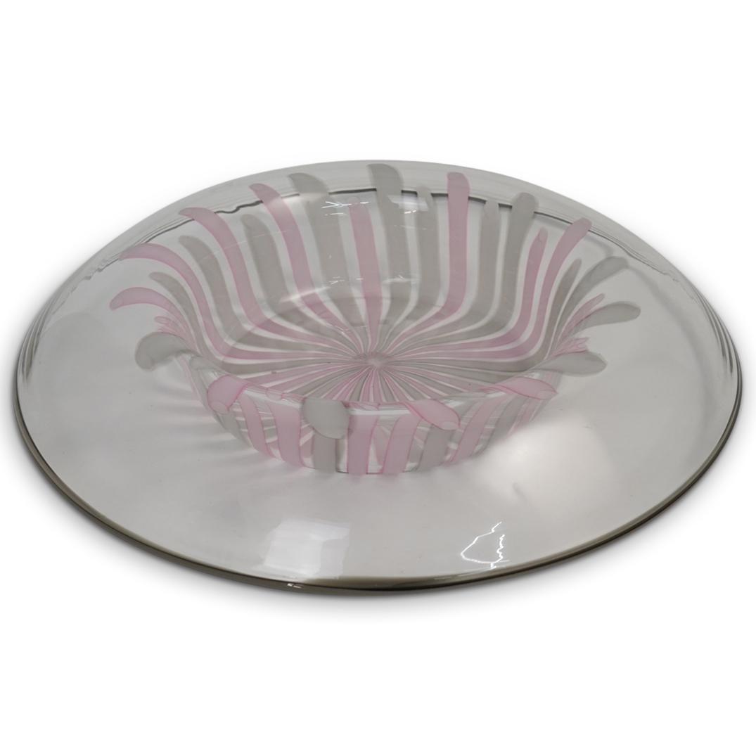 Lino Tagliapietra La Murrina Murano Glass Bowl: DESCRIPTION: A La Murrina murano glass "Saturno" center bowl features rounded edges with a concave center, garnished with white and pink decorations. The edge marked "La Murrina". CIRCA: Mid to Late 2