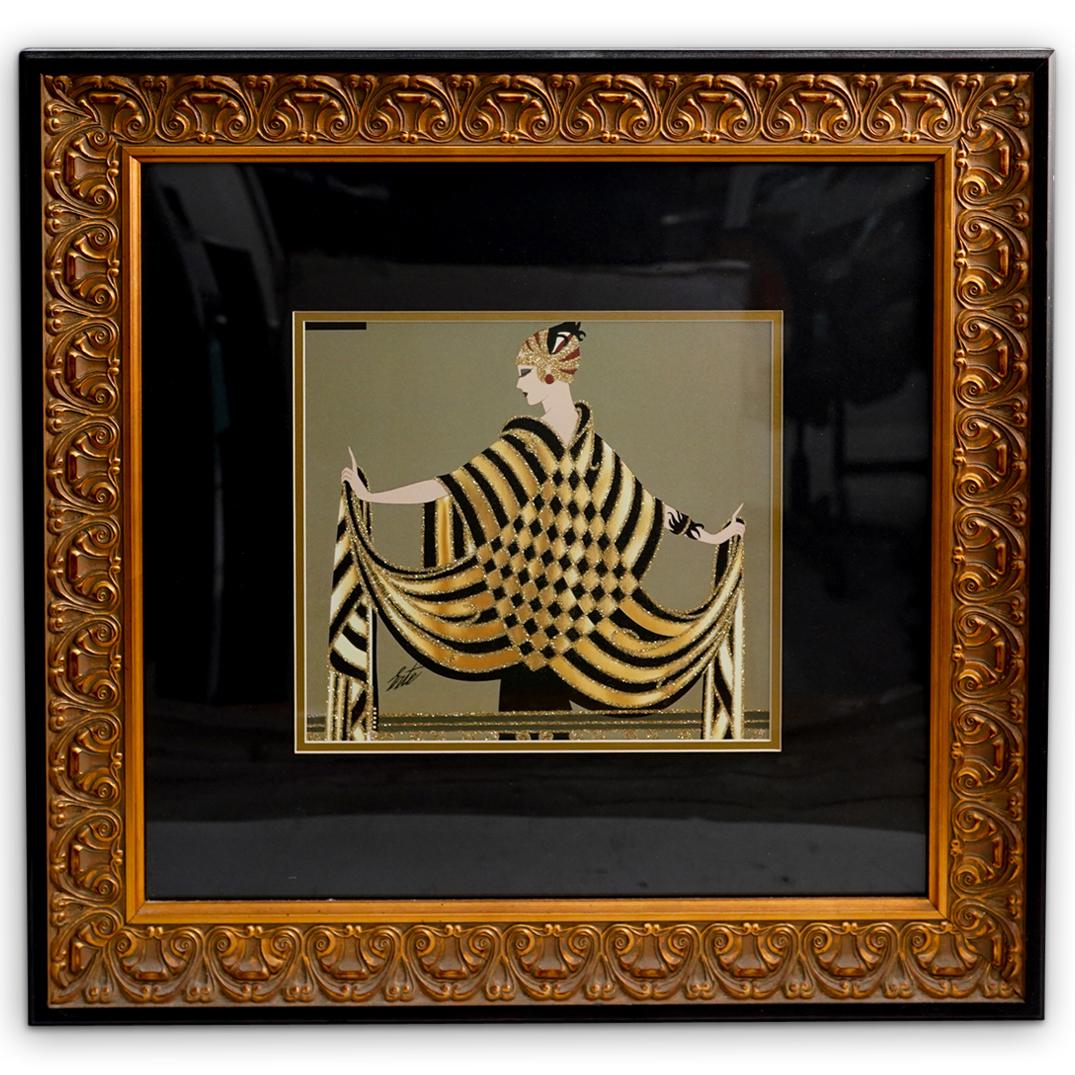 Erte Inspired Print: DESCRIPTION: An Erte inspired print featuring a women in an ornate black and yellow gown. Marked: "Erte" lower left. Mounted in an ornate gilt wood frame. CIRCA: 20th Cent. ORIGIN: Continental DIMENSI