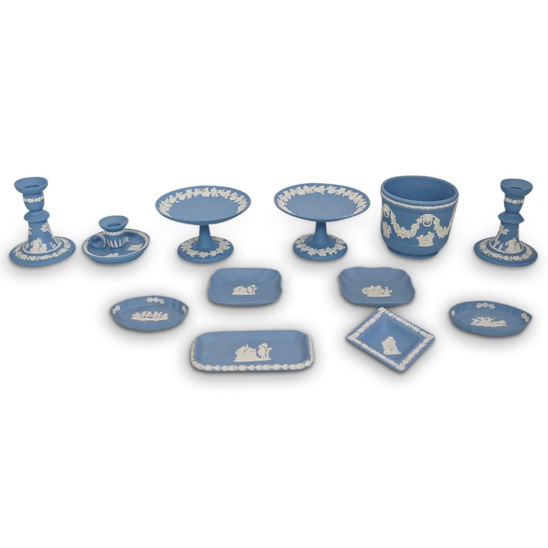 (12 Pc) Wedgwood Blue Biscuit Porcelain Grouping Set: DESCRIPTION: (12 Pc) A Wedgwood biscuit porcelain grouping set in its traditional celeste blue and white jasper color featuring Roman figures along the body and floral white relief throughout. Marked