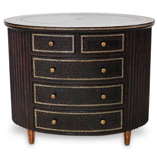 Maitland Smith Leather Embossed Dresser: DESCRIPTION: Maitland Smith oval chest of drawers with tooled leather decorated with leopard print, fitted with pull out drawers along the center. Labeled "Maitland Smith". CIRCA: 20th Century.