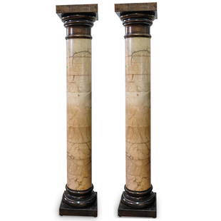 Pair Of Large Alabaster Columns: DESCRIPTION: A Pair of Columns composed of a hollow veined alabaster center, completed with a resin filled metal top and bottom. CIRCA: 20th Century. ORIGIN: Continental DIMENSIONS: H: 86" W: 15.5"