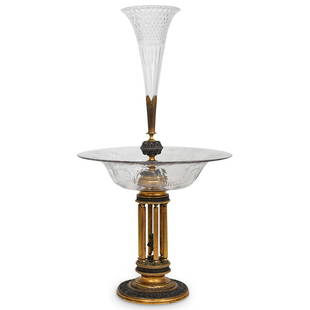 Antique Crystal & Bronze Large Centerpiece: DESCRIPTION: An antique large crystal & bronze centerpiece, composed of a central wide crystal round tray and a tall crystal cornet vase. It is designed with a rounded base consisting of a six