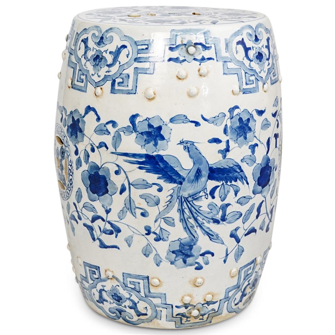 Chinese Blue & White Porcelain Garden Stool: DESCRIPTION: Chinese blue and white porcelain garden stool with floral and dragon decorations. CIRCA: 20th Century. ORIGIN: China DIMENSIONS: H: 18" x D: 14" Have a similar item to sell? Contact: Info
