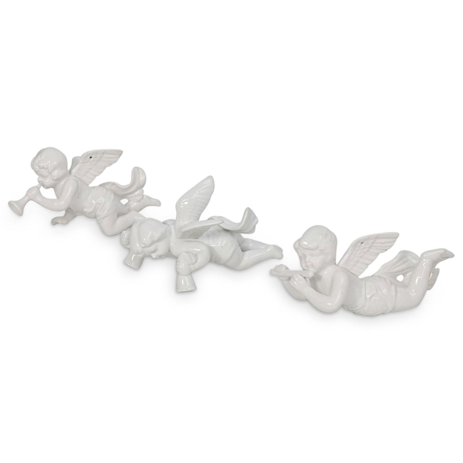 (3 Pc) Fitz and Floyd Angel Porcelain Ornaments: DESCRIPTION: A group of three Porcelain angel ornaments by Fitz and Floyd featuring in an all white hue, completed with a gloss glaze. Stickered "F & F". CIRCA: 20th Century. ORIGIN: Continental DIMEN