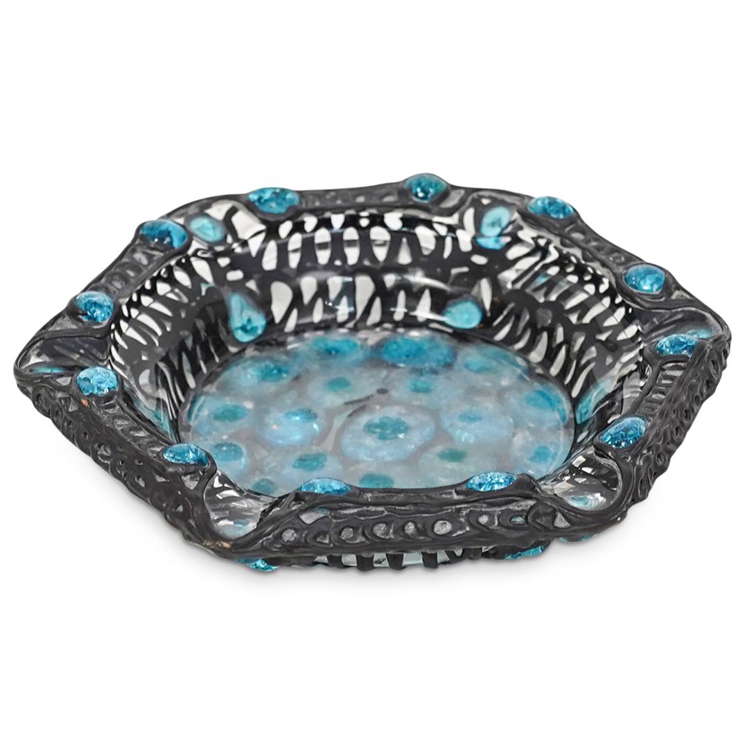 Vintage Murano Glass Ashtray: DESCRIPTION: A Murano glass ashtray composed of a clear foundation covered with lead detailing, further completed with blue glass cabochon accents. CIRCA: Vintage 20th Century. ORIGIN: Italy DIMENSION