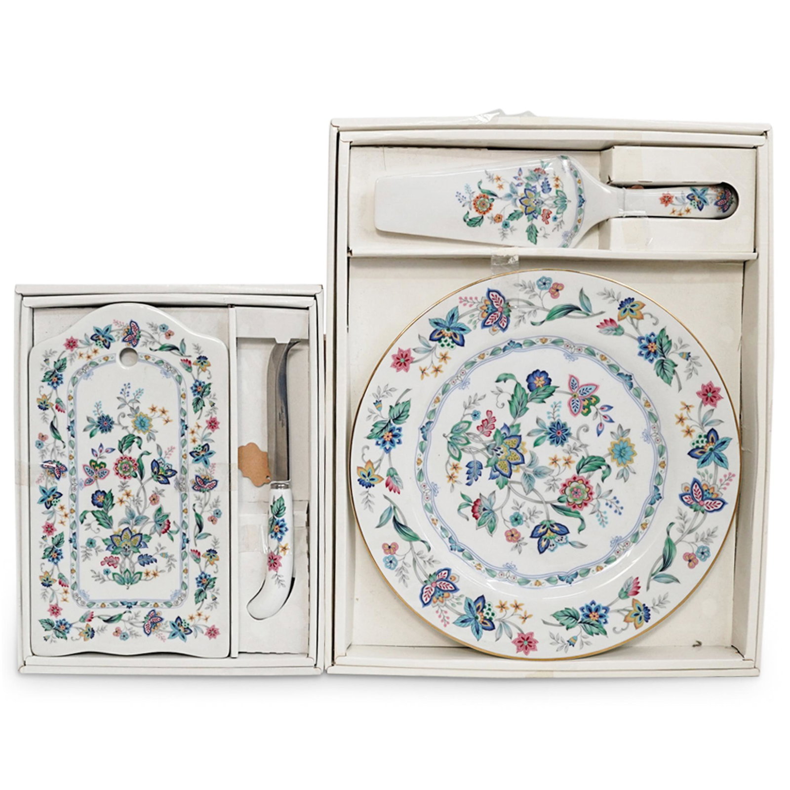 Andrea by Sadek Floral Porcelain Set: DESCRIPTION: An andrea by sadek "Indian Garden" floral pattern porcelain set, includes: (1) Bread plate with knife in original box. (H: 1" x W: 8" x L: 10.5") (1) Cake Plate with spatula in original b
