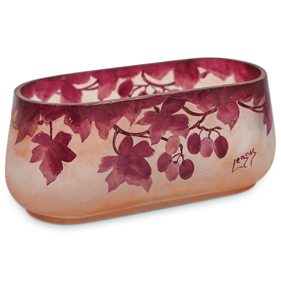 Legras Cameo Glass Bowl: DESCRIPTION: A Legras Cameo glass elongated bowl featuring in a light salmon/beige color, with a wreath of cameo maple leaves covered in rich purple enameling. Marked "Legras". CIRCA: Early 20th Centu