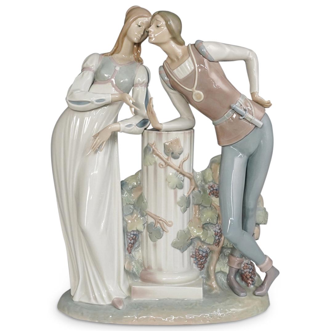 Lladro Porcelain "Romeo and Juliet" Figurine: DESCRIPTION: A Lladro "Romeo and Juliet" glazed porcelain figurine. Model number: 4750. Marked with the blue "Lladro" "Handmade in Spain" hallmark on the bottom. CIRCA: 20th Century. ORIGIN: Spain. DI