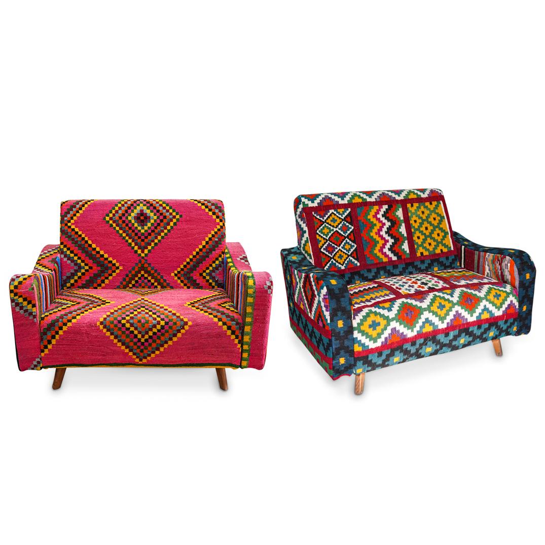 Pair of El Margoum Tunisian Textile Armchairs: DESCRIPTION: A pair of El Margoum Tunisien vibrant colored textile armchairs. Tag marked: El Margoum" attached. CIRCA: 20th Century. ORIGIN: Tunisia DIMENSIONS: H: 41" x W: 33" x L: 56" x Depth: 24" H