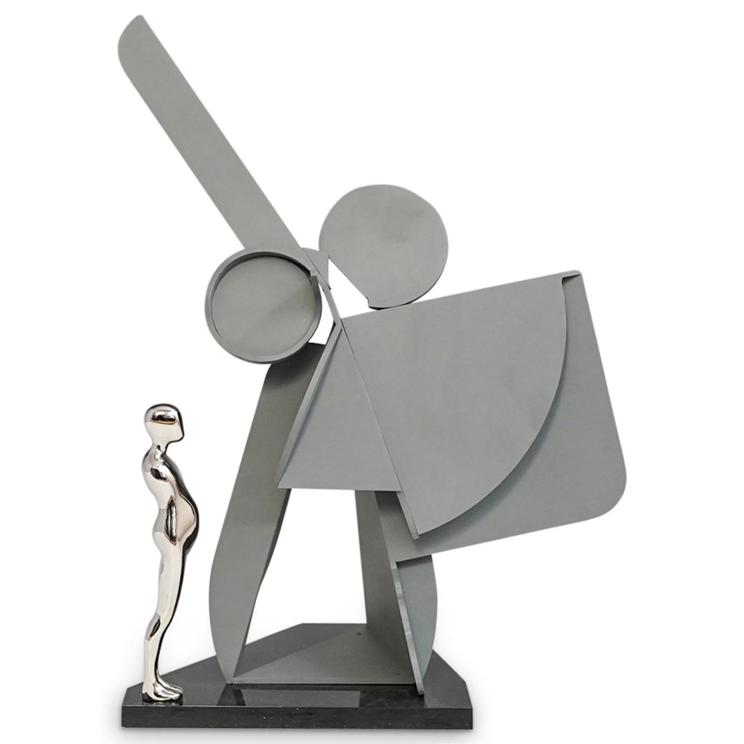 Ernest Trova (American.1927-2009) Study Man Profile: DESCRIPTION: A sculpture by surrealist artist Ernest Trova composed of a cold-rolled steel painted center, fitted with a nickel plated study man figure. Marked along the bottom Edition "56/99" dated 1