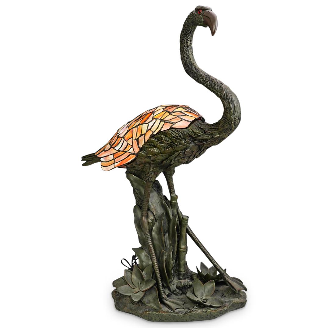 Tiffany Style Flamingo Stained Glass Lamp: DESCRIPTION: A Tiffany style stained glass lamp depicting a flamingo bird. The bird is crafted of very dark finish polyresin with extreme detail. The bird's feathers are of stained glass in a palette