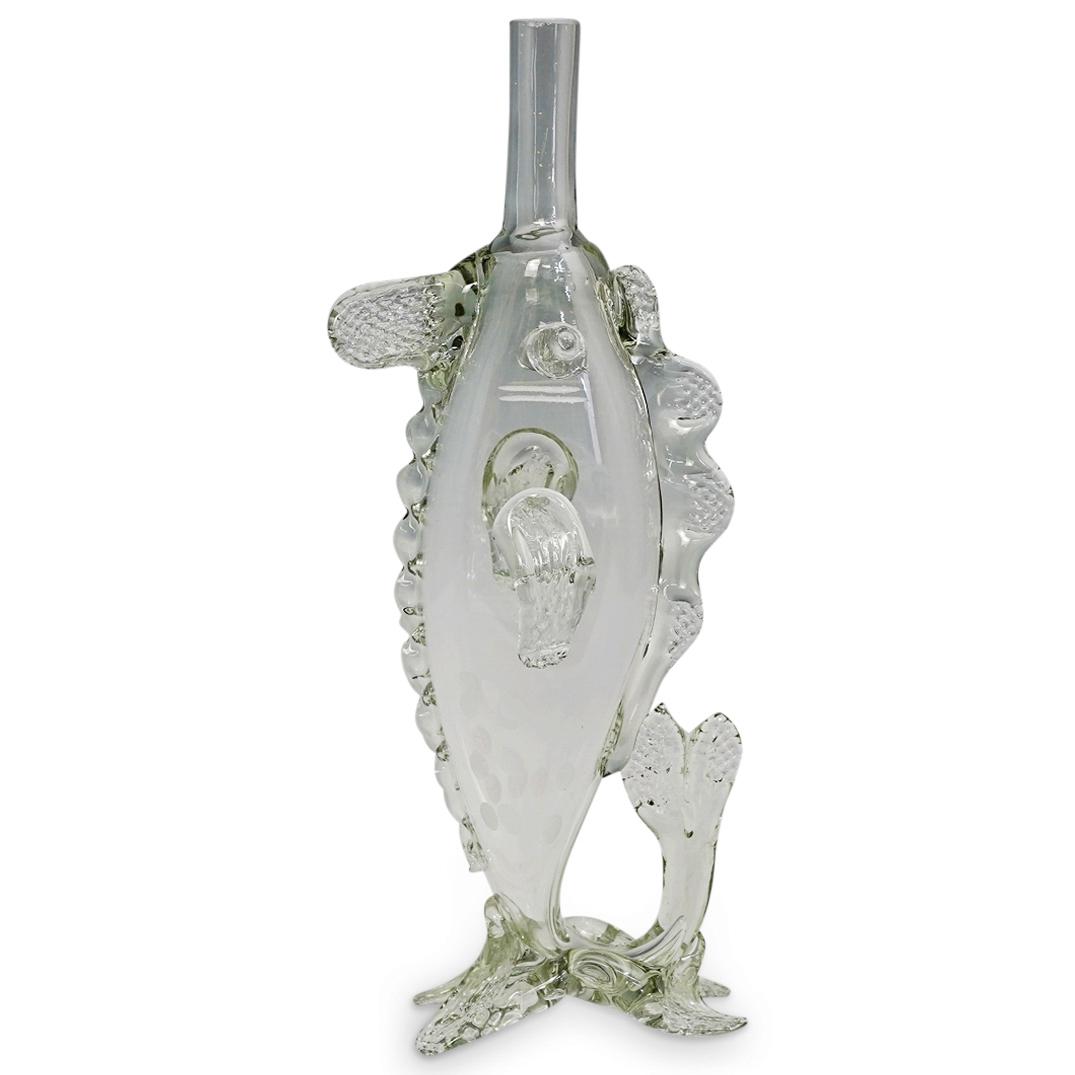 Italian Glass Fish Vase: DESCRIPTION: Am Italian glass blown fish decanter or vase. Features applied fins and curved tail design, can be display upright or horizontally. CIRCA: 20th Cent. ORIGIN: DIMENSIONS: H: 13.25" x W: 3"