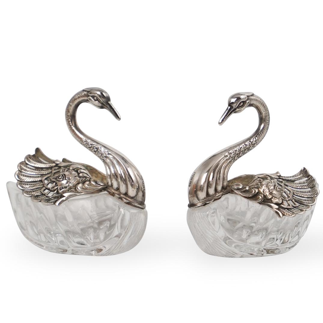 Sterling Silver & Crystal Swan Salt Cellars: DESCRIPTION: Two Salt and pepper cellars featuring swan motif with double segmented crystal body and silver wings that swivel open to reveal crystal interior. CIRCA:20th Ct. ORIGIN:Continental DIMENSI