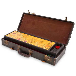 Chinese Bakelite Mahjong Set: DESCRIPTION: A vintage Chinese bakelite Mahjong set. Comprises of five red stands along with bakelite mahjong tiles impressed with artworks and characters and numbers. Finished with a leather briefcas