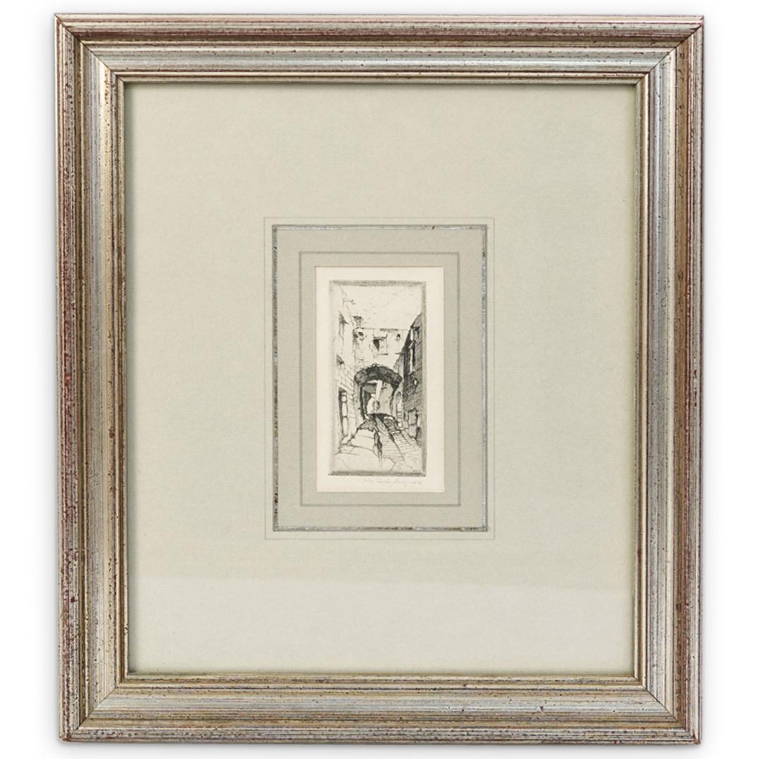 John Taylor Arms (American, b.1887) Etching: DESCRIPTION: John Taylor Arms (American, b.1887) Etching on paper featuring the depiction of a town's alleyway. Pencil signed lower right: "John Taylor Arms, 1926" mounted in a silver toned wood frame