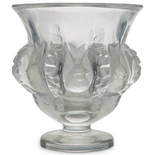 Lalique Crystal "Dampierre" Vase: DESCRIPTION: Lalique "Dampierre" crystal vase. Features an elegant crystal vase by Lalique with doves encompassing the exterior of the bowl with verdant segments in between each relief. Marked on