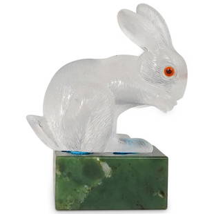 Faberge Style Rock Crystal Rabbit Atop Nephrite Jade: DESCRIPTION: A Faberge Style carved Rock Crystal Rabbit, the rabbit finely carved with realistic details, completed with citrine eyes. Mounted atop a Nephrite Jade square base. CIRCA: Early-Mid 20th