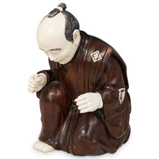 Japanese Wood and Bone Okimono: DESCRIPTION: An antique Japanese wood & bone Okimono figure, beautifully carved as a kneeling japanese man wearing a kimono with inlaid decorations, all finely carved and engraved. The okimono dates