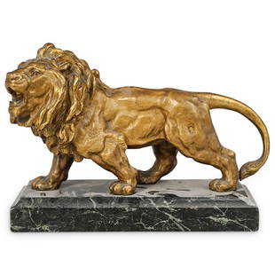 Antique European Lion Bronze: DESCRIPTION: An antique bronze depicts a male lion roaring, executed with realistic details, and mounted atop a black veined marble base. CIRCA: Late 19th to Early 20th Century. ORIGIN: Possibly