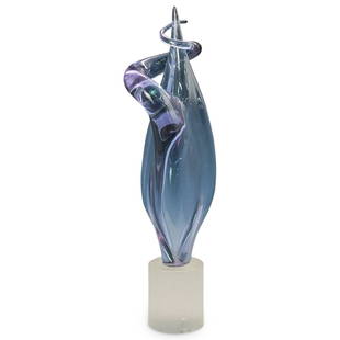 Elio Raffaelli (Italian, 1936) Murano Glass Sculpture: DESCRIPTION: A large Elio Raffaelli (Italian, 1936) Murano glass sculpture of free form design titled "Venus Rising" in amethyst colored glass atop a cylinder clear frosted glass base. CIRCA: 20th