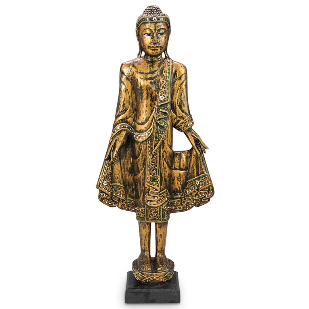 Gilt Wood Carved Buddhist Goddess: DESCRIPTION: A Buddhist goddess sculpture composed of wood with gilt finishes and mirrored accents. Mounted to a square black painted wood base. CIRCA: 20th Century. ORIGIN: India DIMENSIONS: H: 31.5"