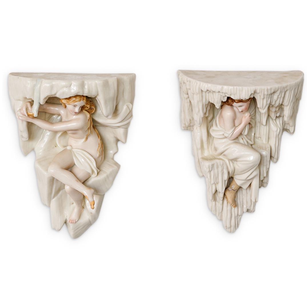 (2 Pc) Royal Worcester "Four Seasons" Wall Brackets: DESCRIPTION: (2Pc) A pair of antique Royal Worcester Porcelain Co. wall shelves depicting "The Four Seasons" features semi-nude allgorical female figures huddled within hanging ice formed interiors. F