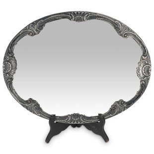 Camusso Peru Sterling Silver Mirrored Tray: DESCRIPTION: Camusso sterling silver mirrored tray with wood foundation, inset beveled center mirror and scrolling acanthus leaf and crest decorated frame. Hallmarked: "Sterling, Made In Peru, Camusso