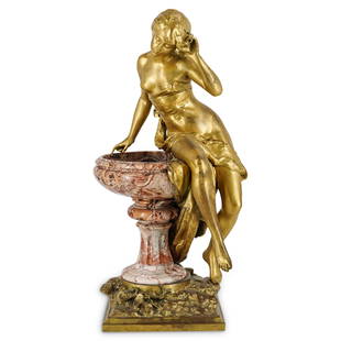 Mathurin Moreau "La Source" Bronze and Marble Sculpture: DESCRIPTION: A Bronze sculpture by Mathurin Moreau titled "La Source", comprised of gilt bronze sculpture depicting a young woman slightly unveiled sitting atop a variegated marble fountain, fitted