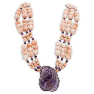 Paulette 14k Gold, Coral and Amethyst Equestrian: DESCRIPTION: A Paulette beaded necklace comprised of Angel coral beads with Amethyst and gold spacers, centered by a carved Amethyst Equestrian pendant, and finished with a 14k gold clasp. Total Weigh