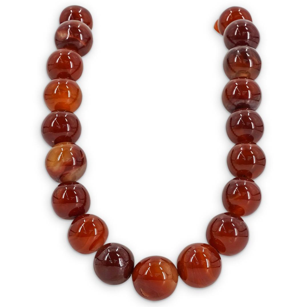 14K Yellow Gold Carnelian Beaded Necklace: DESCRIPTION: Carnelian carved beaded necklace with 14K yellow gold toggle clasp. CIRCA: 20th Cent. DIMENSIONS: (Open) L: 20" x (Bead) D: 22mm Have a similar item to sell? Contact: Info@Akibaantiques.c