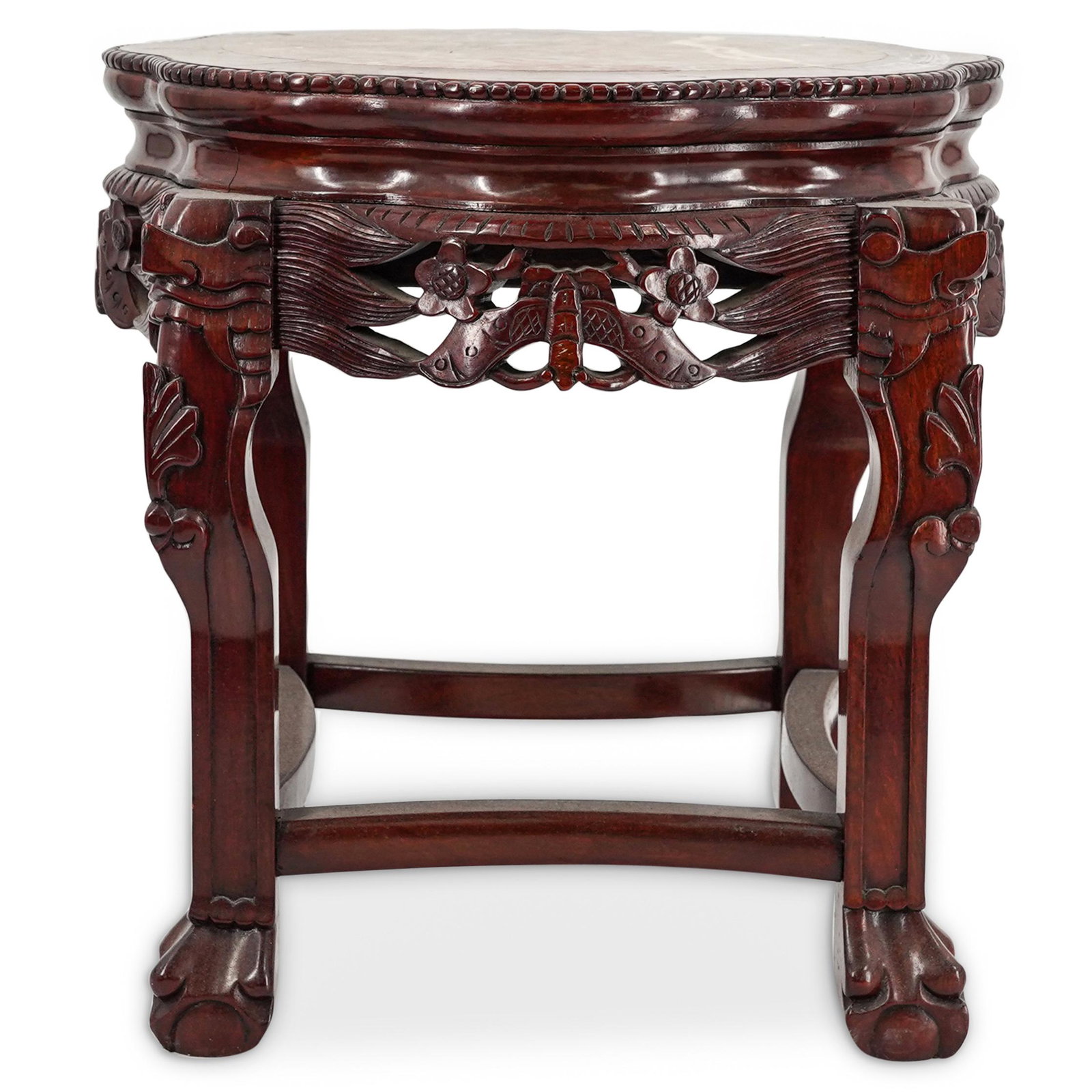 Chinese Wood & Marble Pedestal: DESCRIPTION: Chinese pedestal composed of carved wood with a center marble insert. Features figural mask decorations and paw and ball feet. CIRCA: Mid 20th Cent. ORIGIN: China DIMENSIONS: H: 18.5" x D