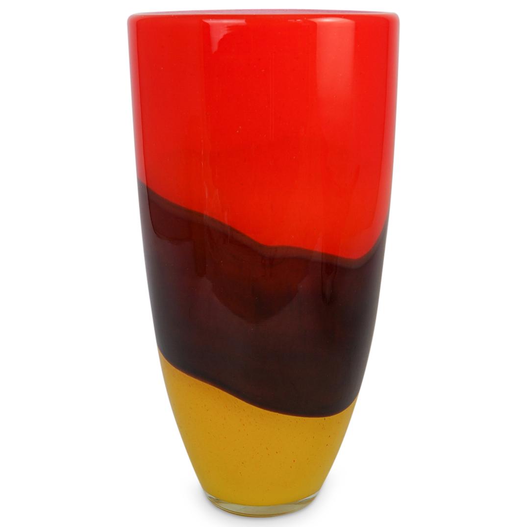 Murano Glass Vase: DESCRIPTION: A Murano vase with thick glass foundation. Features red, brown, and yellow colorations.CIRCA: 20th Cent.ORIGIN: ItalyDIMENSIONS: H: 15.5" x D: 8"CONDITION: Great condition. See lot descri