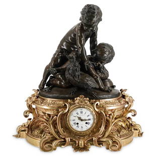 Charpentier & Cia. French Bronze Mantel Clock: DESCRIPTION: Charpentier & Cia. French bronze mantel clock with white enamel face, blue Roman numeral numbering, and two open-work hands. Marked: "Charpentier & Cia. Bronziers, Paris Rue Charlot"