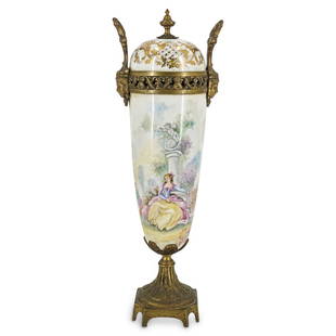 Sevres Style Large Porcelain & Bronze Urn: DESCRIPTION: A Sevres style large porcelain & bronze handled urn in a white ground with a signed hand-painted central scene depicting a young elegant girl seated in a garden and posing as a model for