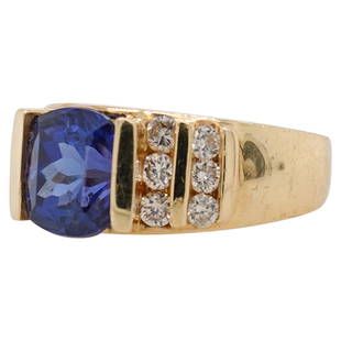 14k Gold, Sapphire and Diamond Ring: DESCRIPTION: A 14k yellow ring centered by an approx 2ct Sapphire, the raised setting is complimented along the shoulders by rows of .03 cts. Diamonds amounting to approx. .35 cts total. Stamped