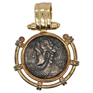 14k Gold and Ancient Coin Pendant: DESCRIPTION: a pendant comprised of a Macedonia Ancient coin depicting alexander the great, encased in a 14k yellow gold frame, attached to a hinged bale. Total Weight: 8.3 Grams (5.3 dwt) CIRCA: 20th