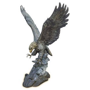 Wildlife Eagle & Fish Garden Statue: DESCRIPTION: Naturalistic cast metal garden sculpture depicting an eagle with spread wings clutching a fish in his talons. Designed with intricate cast feather and wave details. CIRCA: 20th Cent. ORIG