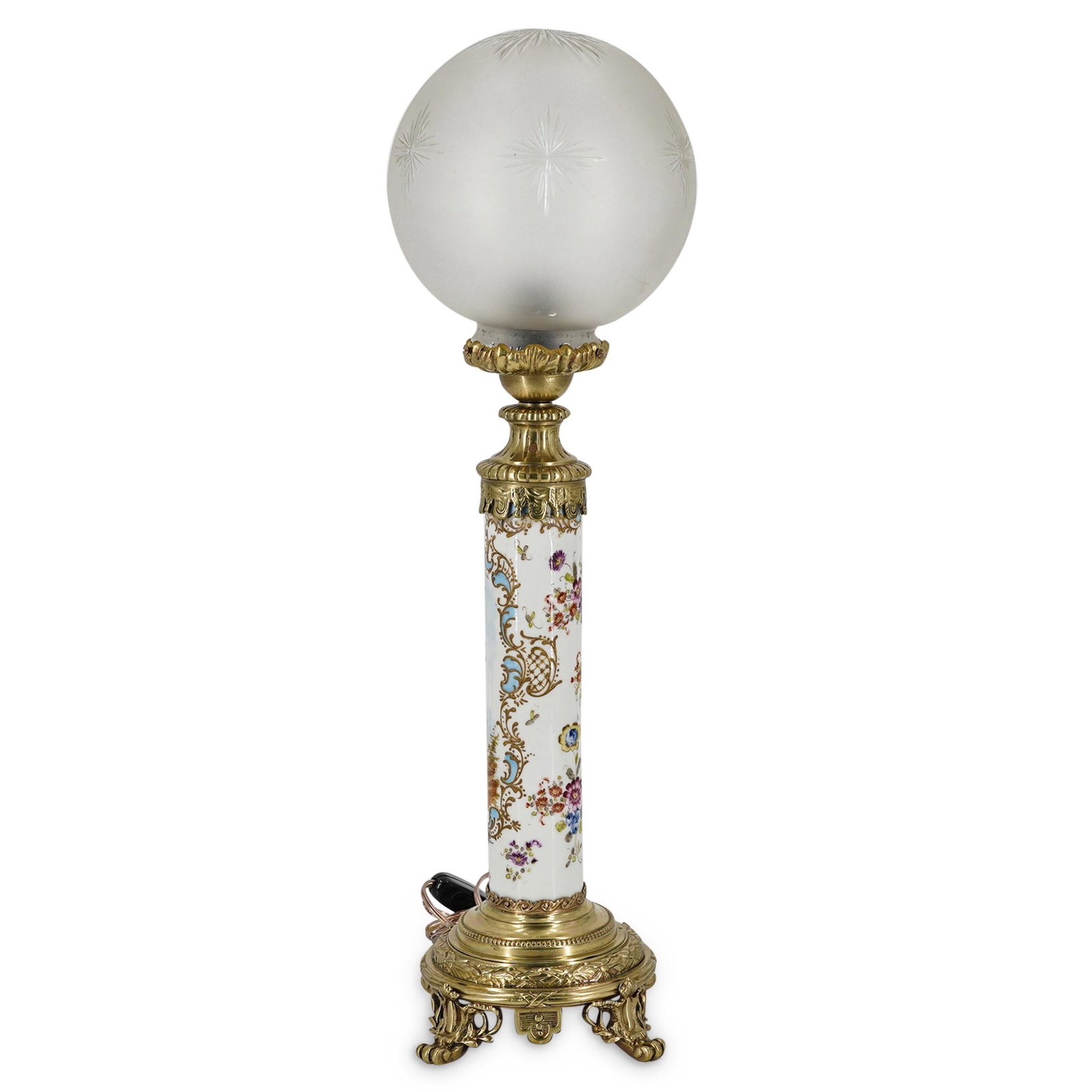 Porcelain And Bronze Lamp With Cut Glass Shade: DESCRIPTION: Electric table lamp with a porcelain body and a frosted glass shade. Porcelain body is decorated with an image of a youth holding a carrier pigeon; image is framed with gilt curvilinear a