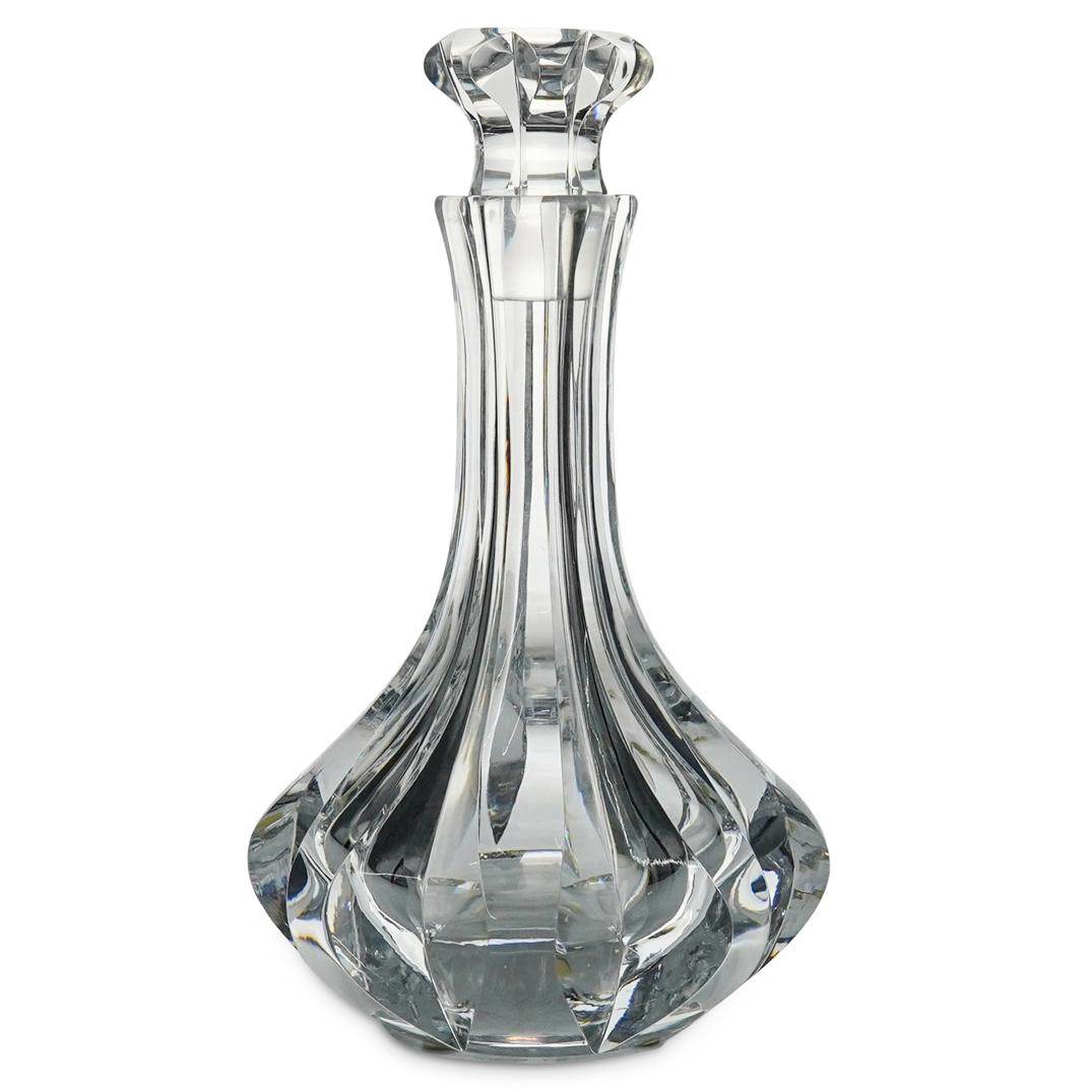 Orrefors Crystal Liquor Decanter: DESCRIPTION: An Orrefors crystal liquor decanter. Marked with engraved signature "Orrefors" and "K 4461-611". CIRCA: 20th Century. ORIGIN: Germany. DIMENSIONS: H: 10 1/2" W: 6". Have a similar item to