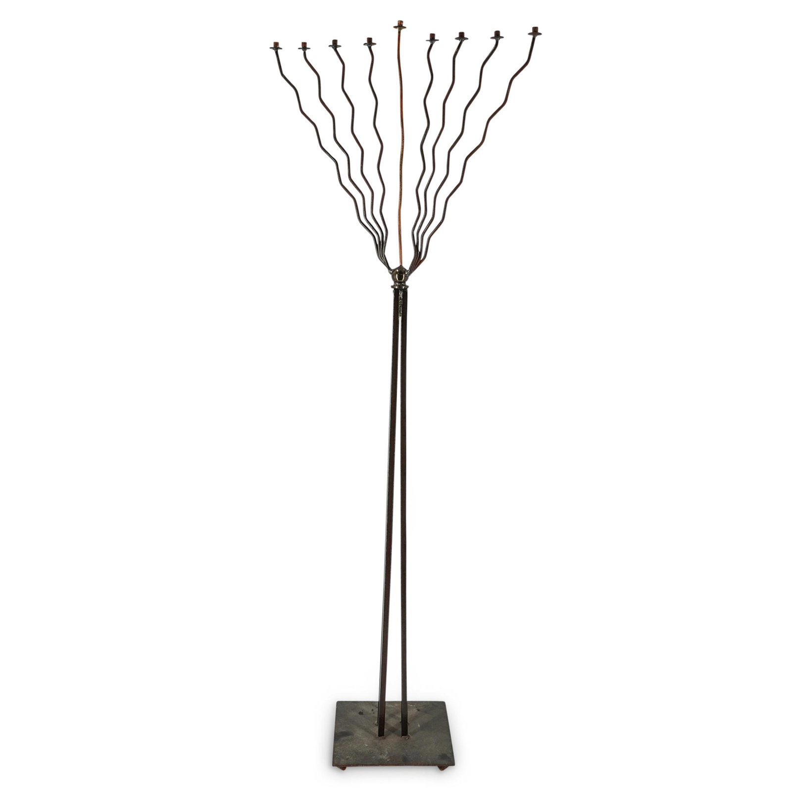 Brutalist Hanukkah Menorah: DESCRIPTION: Hanukkah menorah featuring a brutalist aesthetic with lightly meandering branches extending from a sphere on four legs. CIRCA: 20th Century ORIGIN: Israel DIMENSIONS: H: 58.5" W: 10" L: 2
