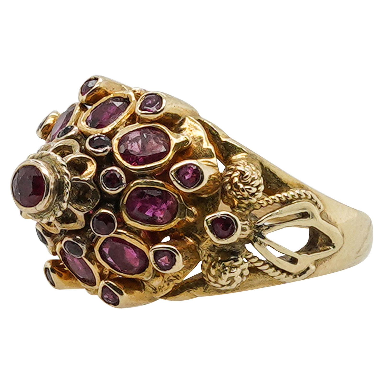 12K Yellow Gold & Ruby Mughal Style Ring: DESCRIPTION: 12K Yellow gold Mughal style ring with inset ruby details. CIRCA: 19th Cent. DIMENSIONS: (Size: 5.5) (Total Weight: 3.00 Dwt.) Have a similar item to sell? Contact: Info@Akibaantiques.com
