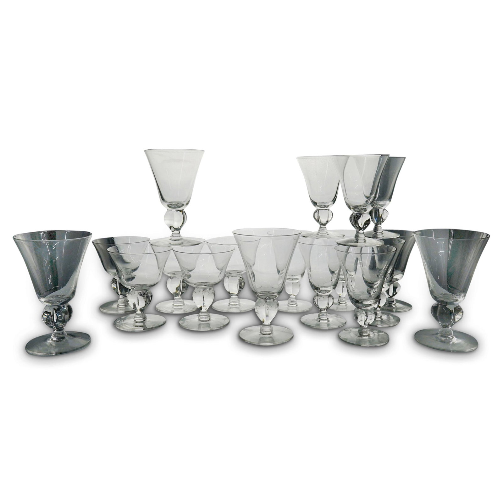 (18 Pc) Mid Century Swedish Siegfried Stahl Crystal: DESCRIPTION: (18 Pc) A set of Swedish Mid century crystal stemware set. This is a set of eighteen (18) crystal glasses designed by Siegfried Stahl for Skruff in the Gulli pattern. This scandinavian de