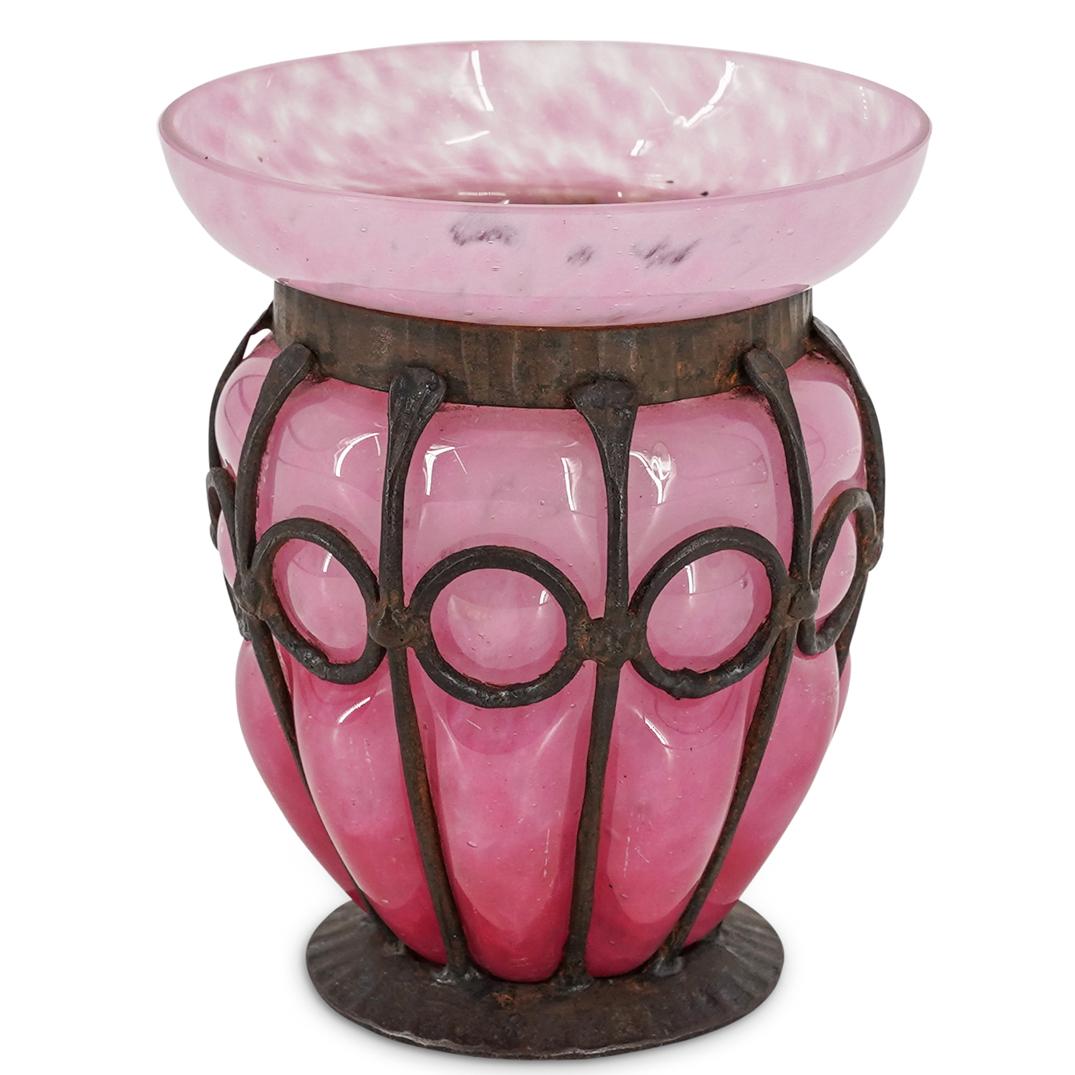 Charles Schneider (1881-1953) Blow-Out Glass & Wrought: DESCRIPTION: Charles Schneider (1881-1953) Molted glass and wrought Iron vase. Features a pink blown-out glass with wrought iron, ring accented exterior. Signed: "Schneider, France" CIRCA: Early to Mi