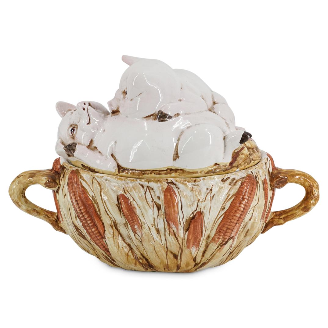 Italian Porcelain Pig Tureen: DESCRIPTION: Porcelain tureen featuring a lid with two pigs lounging and corn ears and husks on the sides. Finished with two handles glazed brown. Sticker on underside: "Made in Italy". CIRCA: 20th Ce