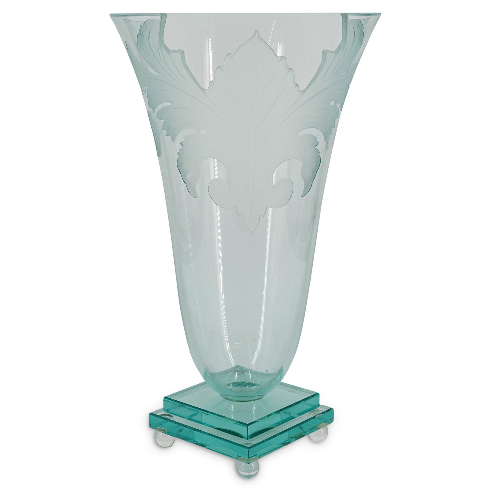 Frosted Etched Foliage Glass Vase: DESCRIPTION: Clear glass vase with etched foliage design in frosted glass. Piece has a square double-tiered platform base on spherical feet, and foliage design forms part of the lip. CIRCA: 20th Centu
