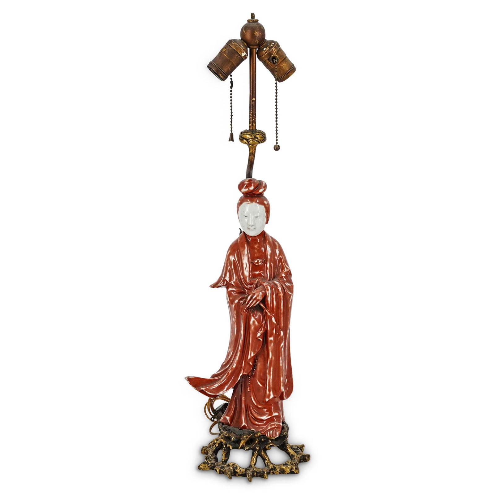 Antique Chinese Bronze Mounted Porcelain Guan Yin Lamp: DESCRIPTION: An antique Porcelain Guan Yin figure decorated with a redware glaze, mounted atop a open pierced bronze base, converted into a lamp. CIRCA: Late 19th Cent. ORIGIN: China DIMENSIONS: H: 25