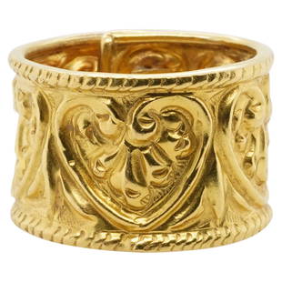 Zolotas 22k Gold Relief Ring: DESCRIPTION: A 22k Yellow gold Zolotas ring features an overlapping frame, decorated with relief patterns, stamped along the inner band "Zolotas 22C". Total Weight: 6 dwt. Notes* Established in