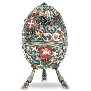 19th Cent. Pavel Akimov Ovchinnikov Silver Cloisonne: DESCRIPTION: 19th Cent. Pavel Akimov Ovchinnikov silver cloisonne egg, features a silver foundation with heavily detailed, scrolling floral and foliate motifs, completed with vibrant polychrome