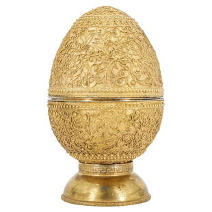 Russian Gilt Filigree Egg: DESCRIPTION: Russian egg designed with gilt scrolling foliate work throughout. Separated at mid-section to reveal inner gold finishes, Hallmarkings at rim: "A.O." over "1893" "AA" with (Double Eagle)