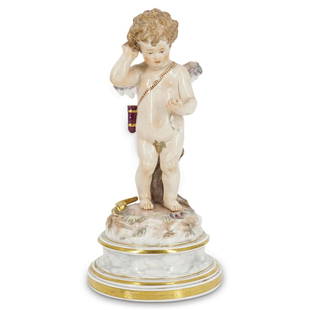 Meissen Porcelain Cupid Cherub Figurine: DESCRIPTION: A Meissen porcelain Cupid cherub figurine. This is a Meissen porcelain figure from the L-Series. Numbered L118. and titled "Cupid with a basket". Marked with the double sword "Meissen"